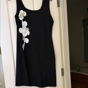 Elegant Black Dress with White Floral Accents